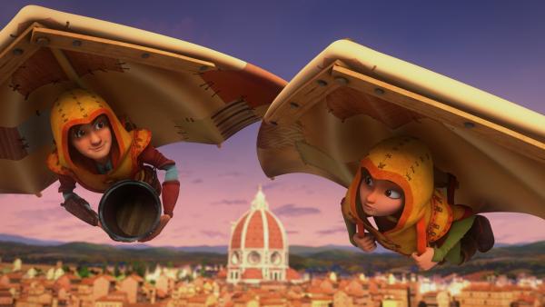 Leo und Lisa fliegen in den Gleitern über der Stadt Florenz.